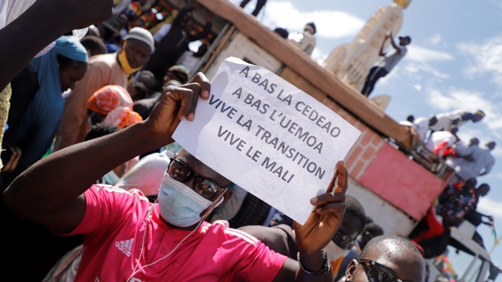Supporters participate in a demonstration called by Mali's transitional government after ECOWAS (Economic Community of West African States) imposed sanctions in Bamako, Mali, Jan. 14, 2022. 