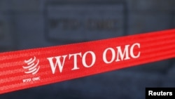 FILE:: A logo is pictured outside the World Trade Organization (WTO) building in Geneva, Switzerland, April 1, 2021.TRADE-WTO/