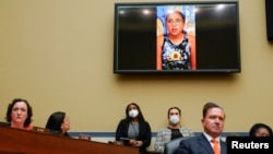 Miah Cerrillo, a student at Robb Elementary School in Uvalde, Texas, and survivor of a mass shooting appears on a screen during a House Committee on Oversight and Reform hearing on gun violence on Capitol Hill in Washington, June 8, 2022.