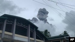 Ash and steam spew from Mount Bulusan, as seen from Casiguran, Sorsogon province, Philippines, June 5, 2022.