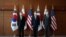 Kim Gunn, South Korea's new special representative for Korean Peninsula peace and security affairs, his U.S. counterpart Sung Kim and Japanese counterpart Takehiro Funakoshi pose for photographs before their meeting at the Foreign Ministry in Seoul, South Korea, June 3, 2022. 