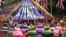 Performers wearing costume take part in a parade during the Platinum Jubilee Pageant, marking the end of the celebrations for the Platinum Jubilee of Britain's Queen Elizabeth, in London, June 5, 2022. 