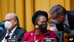 Rep. Sheila Jackson Lee, D-Texas, with Rep. Steve Cohen, D-Tenn., at left, confers with a staffer as the House Judiciary Committee returns from recess to hold an emergency meeting to advance a series of Democratic gun control measures, called the Protecting Our Kids Act, in response to mass shootings in Texas and New York, at the Capitol in Washington, June 2, 2022.