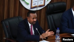 FILE: Ethiopia's Prime Minister Abiy Ahmed responds to questions at the Parliament in Addis Ababa, Ethiopia, February 1, 2019.