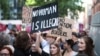 Protestors demonstrate outside the Home Office against the British Governments plans to deport asylum seekers to Rwanda, in London, Britain, June 13, 2022. 