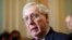 Senate Minority Leader Mitch McConnell, R-Ky., speaks with reporters following a closed-door policy lunch at the Capitol in Washington, May 24, 2022.