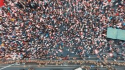 An aerial view of Lebanese protesters gathering along the side of the Beirut-Jounieh highway in the northern Beirut suburb of Jal el-Dib on the seventh day of protest against tax increases and official corruption, Oct. 23, 2019 .