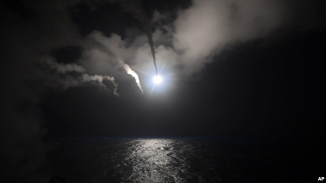 The U.S. Navy guided-missile destroyer USS Porter launches a Tomahawk missile in the Mediterranean Sea, April 7, 2017. The United States blasted a Syrian airfield with a barrage of cruise missiles in retaliation for this week's chemical weapons attack against civilians.