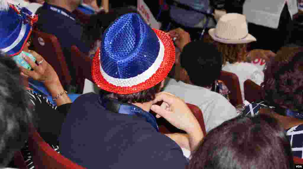 Delegates sport their hats at the DNC in Philadelphia (Photo: S. Barua/VOA)