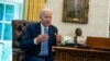 FILE - U.S. President Joe Biden speaks during an interview in the Oval Office of the White House, in Washington, June 16, 2022. 