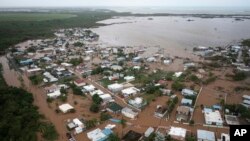 Poplavljene kuće u mestu Salinas bič u Portoriku, 19. septembar 2022.