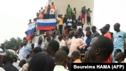 FILE: People demonstrate against French military presence in Niger on September 18, 2022 in Niamey.