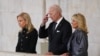 President Joe Biden and first lady Jill Biden (right) view the coffin of Queen Elizabeth II, lying in state on the catafalque in Westminster Hall in London, Sept. 18, 2022.