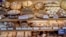 FILE - Bread with price tags waits for customers in the market hall in Frankfurt, Germany, June 14, 2022. European bread prices were 18% higher in August 2022 than a year earlier, Eurostat reported. 