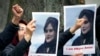 FILE - Exile Iranians of the National Council of Resistance of Iran gather in front of the embassy of Iran in Berlin, Germany, Sept. 20, 2022, after the death of an Iranian woman held by the country's morality police.