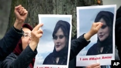 FILE - Exile Iranians of the National Council of Resistance of Iran gather in front of the embassy of Iran in Berlin, Germany, Sept. 20, 2022, after the death of an Iranian woman held by the country's morality police.