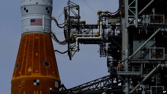 The NASA moon rocket stands on Pad 39B before the Artemis 1 mission to orbit the moon at the Kennedy Space Center, Friday, Sept. 2, 2022, in Cape Canaveral, Fla. (AP Photo/Brynn Anderson)