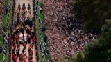 The Ceremonial Procession of the coffin of Queen Elizabeth II travels down the Long Walk as it arrives at Windsor Castle for the Committal Service at St George's Chapel, in Windsor, England, Monday, Sept. 19, 2022. (Aaron Chown/Pool photo via AP)