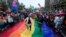 People take part in the European LGBTQ pride march in Belgrade, Serbia, Sept. 17, 2022. 