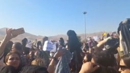 A screenshot of video circulating on social media purports to show women in Saqez, Iran, removing their headscarves in protest against the death of 22-year-old Mahsa Amini, who died after being detained by morality police enforcing strict hijab rules.
