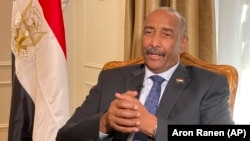 FILE: Sudan's General Abdel Fattah al-Burhan, answers questions during an interview. Taken Sept. 22, 2022, in New York