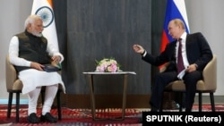 资料照：印度总理莫迪与俄罗斯总统普京在乌兹别克斯坦撒马尔罕出席上海合作组织首脑会议期间举行会谈。（2022年9月16日）