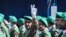A member of Iran's Basij paramilitary force flashes a victory sign during a military parade just outside Tehran, Iran, Sept. 22, 2022.