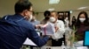Nearly 300 Demand South Korea Probe Their Adoptions Abroad 