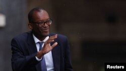 FILE - Secretary of State for Business, Energy, and Industrial Strategy Kwasi Kwarteng arrives at Number 10 Downing Street, in London, Sept. 6, 2022.