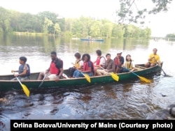 International students on a canoe trip on the Stillwater River near the University of Maine campus in Orono, Maine.