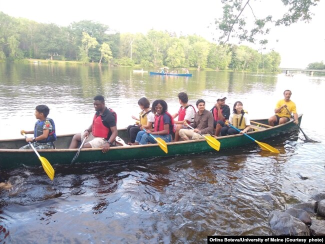 International students on a canoe trip on the Stillwater River near the University of Maine campus in Orono, Maine.