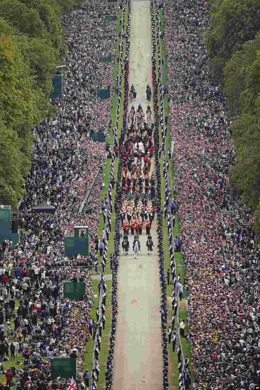 The Ceremonial Procession of the coffin of Queen Elizabeth travels down the Long Walk as it arrives at Windsor Castle for the Committal Service at St. George&#39;s Chapel, Sept. 19, 2022.