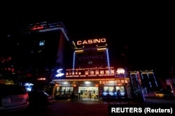 FILE - A Chinese Restaurant, Hotel and Casino was seen at the Preah Sihanoukville province, Cambodia, Sept. 27, 2017.