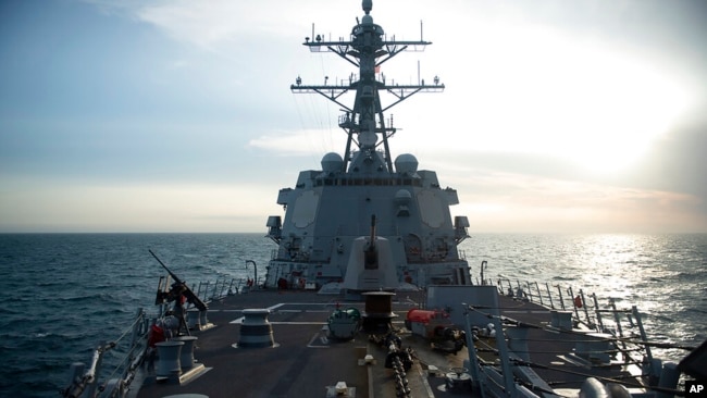 FILE - The U.S. Navy's Arleigh Burke-class guided-missile destroyer USS Sampson conducts a routine Taiwan Strait transit, April 26, 2022. (U.S. Pacific Command via AP)