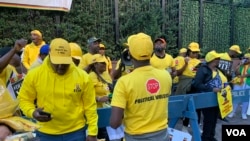 FILE - Members of the Citizens Coalition for Change party protesting against Zimbabwe's President Emmerson Mnangagwa in New York, Sept. 24, 2022.