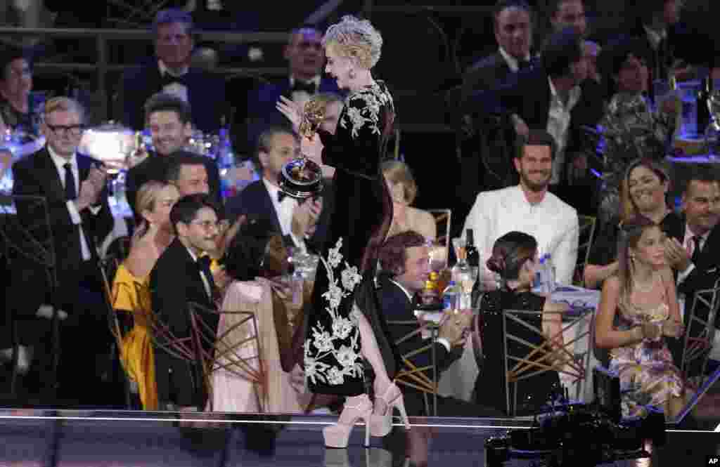 Julia Garner accepts the Emmy for outstanding supporting actress in a drama series for &quot;Ozark&quot; at the 74th Primetime Emmy Awards, Sept. 12, 2022, at the Microsoft Theater in Los Angeles.