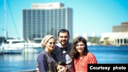 Basma Alawee at her new hometown in Jacksonville, Florida, with her husband and two daughters. (Courtesy Basma Alawee) 