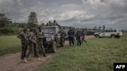 Wanajeshi na polisi wa jamhuri ya kidemokrasia ya Congo wakiwa Rutshuru, siku chache baada ya waasi wa M23 kupigana na wanajeshi wa serikali. April 3, 2022 PICHA: AFP