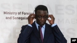 FILE - Senegal's then-Foreign Minister Amadou Ba attends a press conference at the Presidential Palace, in Dakar, Senegal, Feb. 16, 2020.