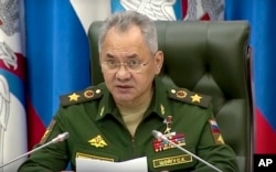 Menteri Pertahanan Rusia Sergei Shoigu menyampaikan sambutan yang disiarkan televisi di Moskow, Rabu, 21 September 2022. (Layanan Pers Kementerian Pertahanan Rusia via AP)