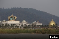 FILE - The Blue Shield casino operated by the Kings Romans Group stands in the Golden Triangle special economic zone on the banks of the Mekong river in Laos near the border between Laos, Myanmar and Thailand, March 2, 2016.