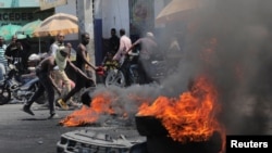 En Fotos |  Persisten las protestas antigubernamentales en Haití