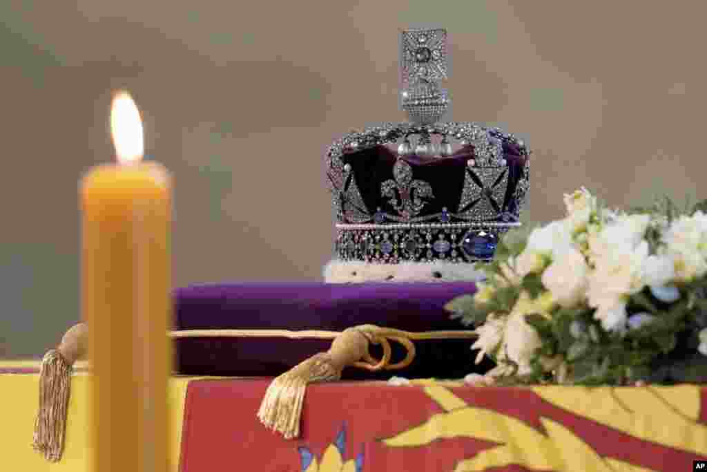 The Imperial State Crown sits on the coffin of Queen Elizabeth II in Westminster Hall in London, Sept. 14, 2022.
