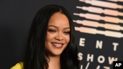 FILE - Rihanna attends an event for her lingerie line Savage X Fenty at the Westin Bonaventure Hotel in Los Angeles on on Aug. 28, 2021.