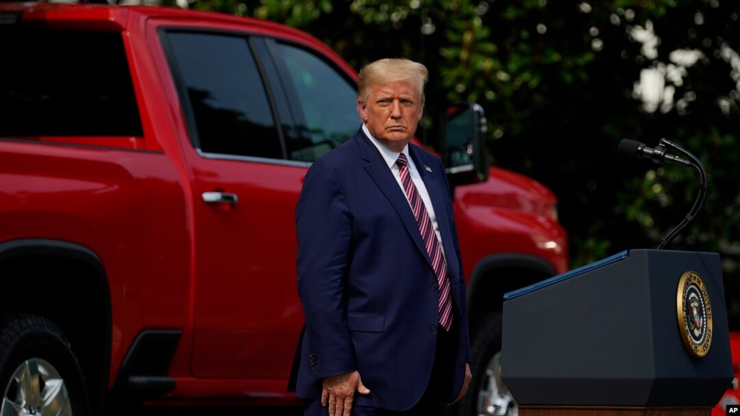 President Donald Trump pauses as he speaks during an event on regulatory reform on the South Lawn of the White House, July 16, 2020, in Washington. 