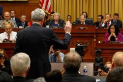 Former special counsel Robert Mueller is sworn in by House Judiciary Committee Chairman Jerrold Nadler, a Democrat, to testify before the Committee on his report on Russian election interference, on Capitol Hill, in Washington, July 24, 2019.