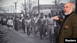 Stephen Somerstein talks about a photo he took during the famous 1965 Selma-to-Montgomery march in Alabama at the New-York Historical Society, Jan. 14, 2015. 