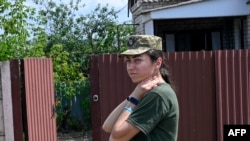 Kateryna Novakivska, 29, deputy commander of a unit in the Donbas region, eastern Ukraine, participates in an AFP interview on July 26, 2022, amid the Russian invasion of Ukraine.