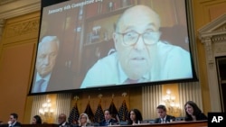 A video deposition from Rudy Giuliani is shown as the House select committee investigating the January 6 attack on the U.S. Capitol holds a hearing at the Capitol in Washington, July 12, 2022.