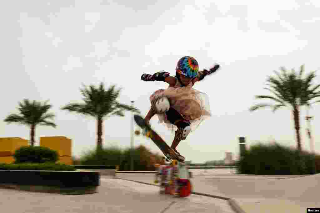 Zarah Ann Gladys, 6, rides her skateboard in Dubai, United Arab Emirates, July 26, 2022.